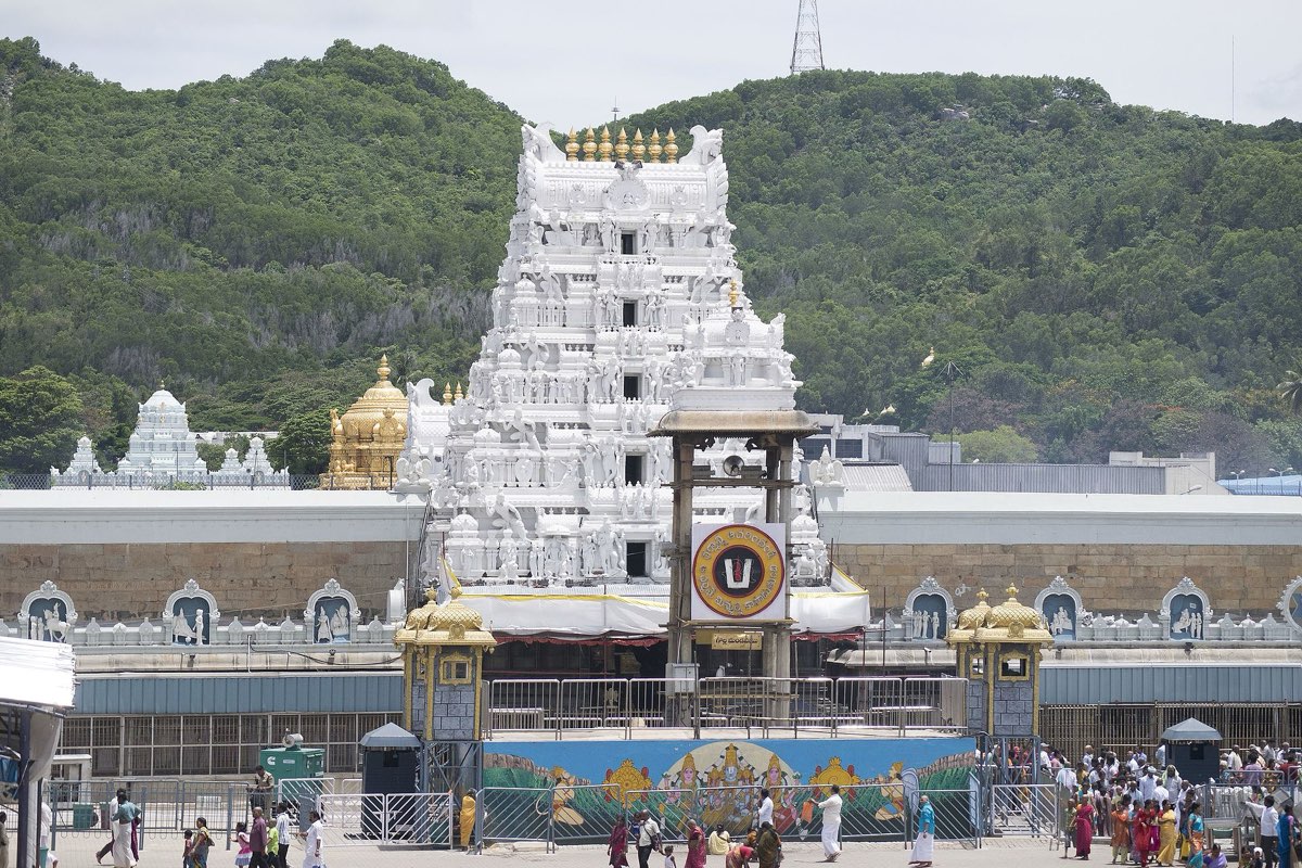 The gopuram of the Sri Venkateswara temple at Tirumala with the golden vimana behind